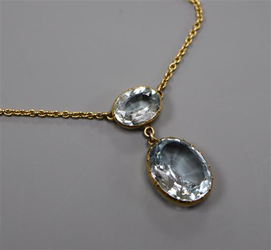 An early 20th century 9ct yellow metal and aquamarine set drop pendant necklace, pendant 31mm.